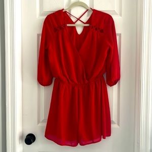 Womens red romper size L MONTEAU Los Angeles never worn. Stretch waist